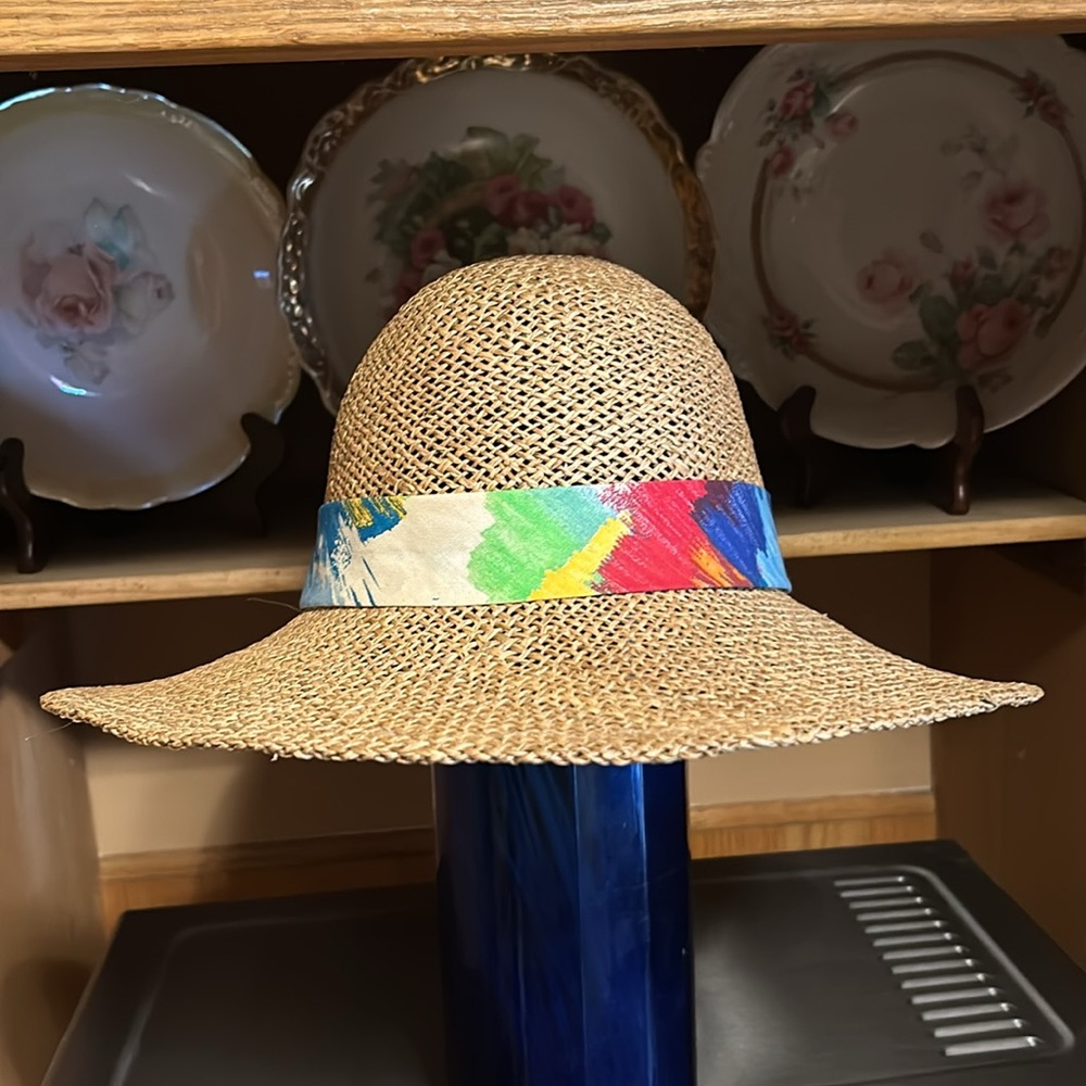 Women’s Beautiful basket weave hat with upturned brim very colorful rim ribbon